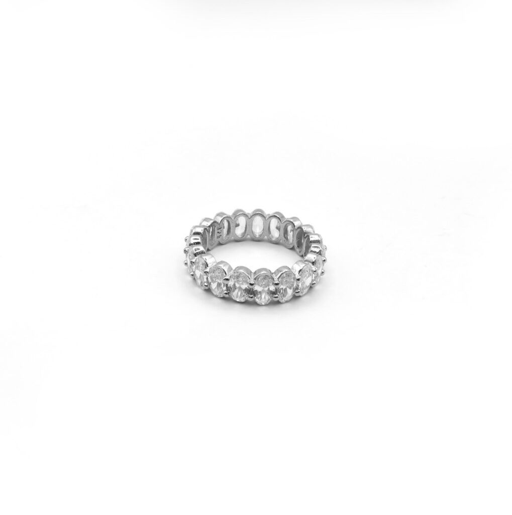 925 sterling silver eternity band with round-cut stones. 6 mm depth